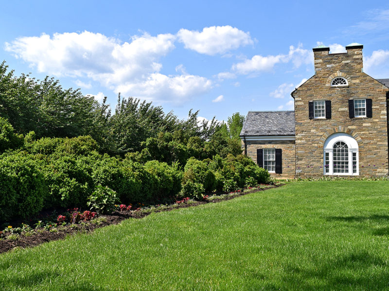 front lawn and boxwood hedges at Glenview Mansion in Rockville, Maryland