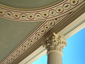 ornate columns and painted ceiling at The Getty Villa, located in Malibu, California