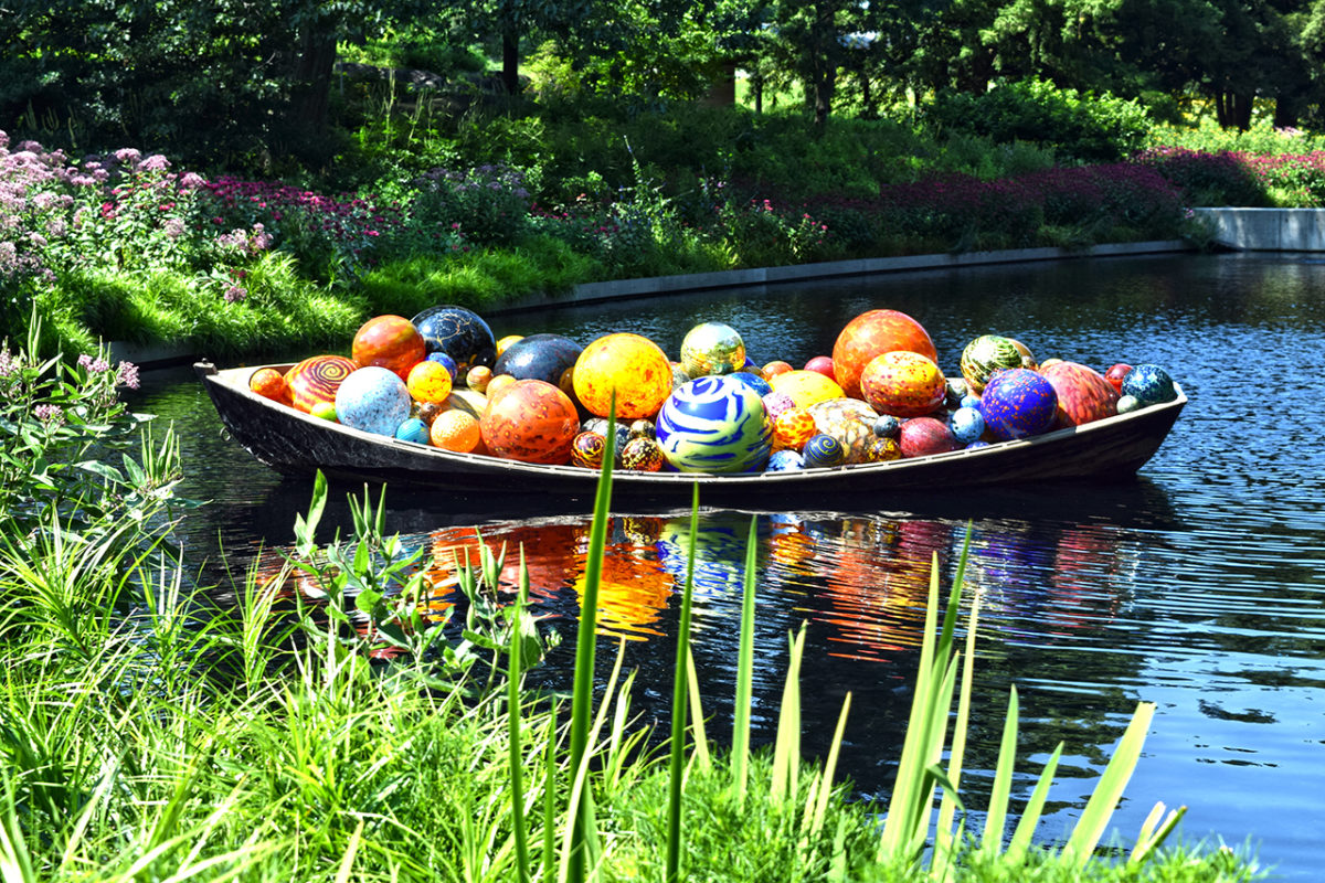 glass sculpture by Dale Chihuly on the grounds of the New York Botanical Garden