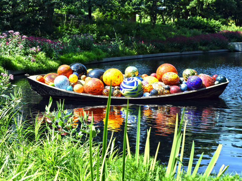 glass sculpture by Dale Chihuly on the grounds of the New York Botanical Garden