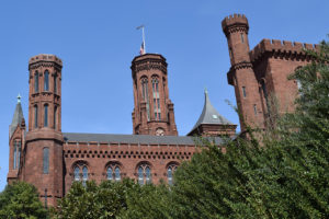 Smithsonian Castle and boxwood hedges from The Enid A. Haupt Garden in Washington, D.C.