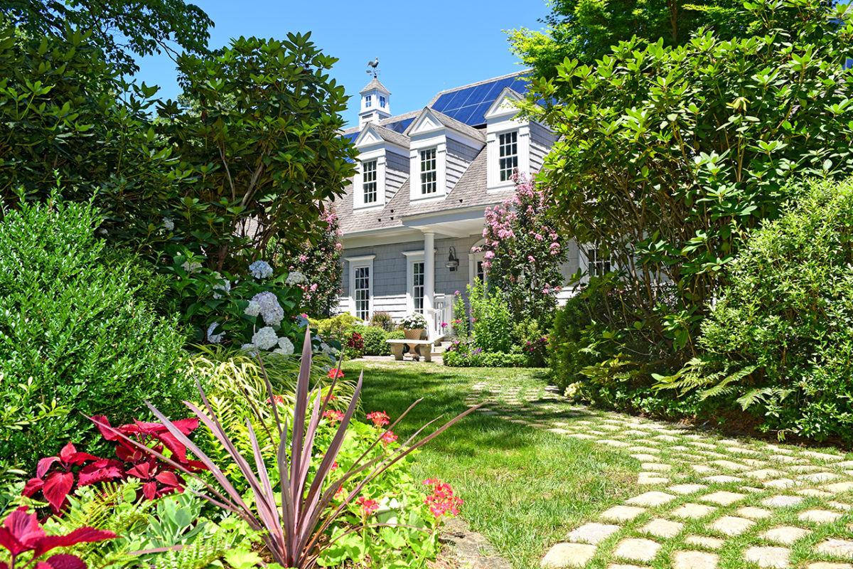 view of home from gardens at Mill Pond Garden in Lewes, Delaware