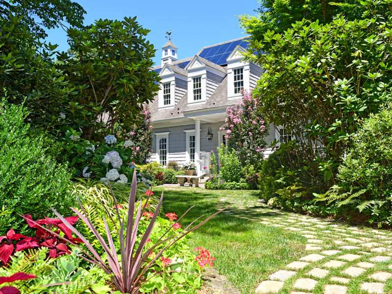 view of home from gardens at Mill Pond Garden in Lewes, Delaware